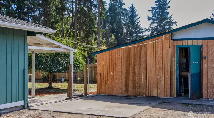 Long driveway in with ample off-street parking to back pad, and two small workshop areas. Back yard covered patio to middle left and large back yard with some nice surprises!