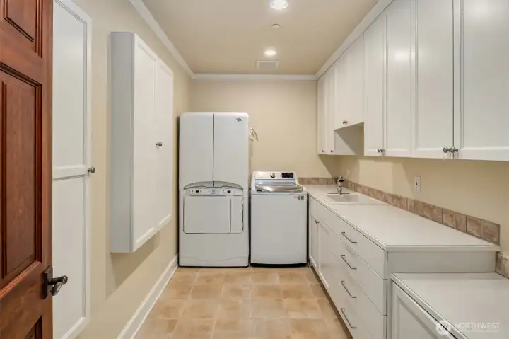 2nd floor laundry with steam dryer