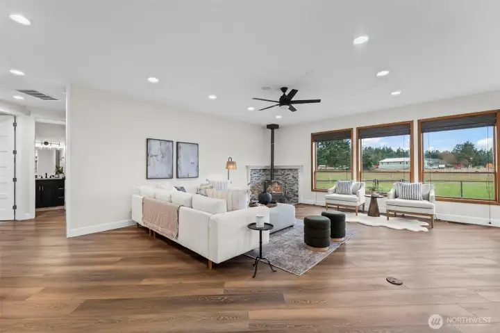 The large windows throughout create a home full of natural light and peaceful views.