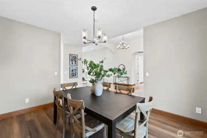 The formal dining room sits proudly off the foyer with enough space for the table of your dreams