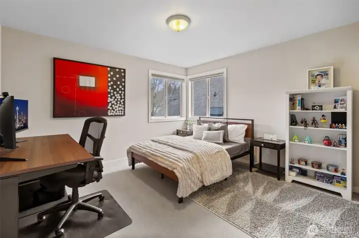 Large additional guest room with a walk-in closet.