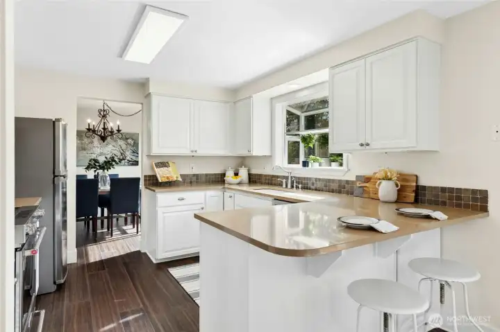 Refreshed kitchen plus new microwave and garbage disposal.