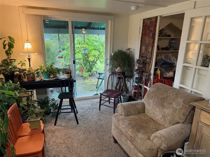 1279 Living with door to bedroom at right.