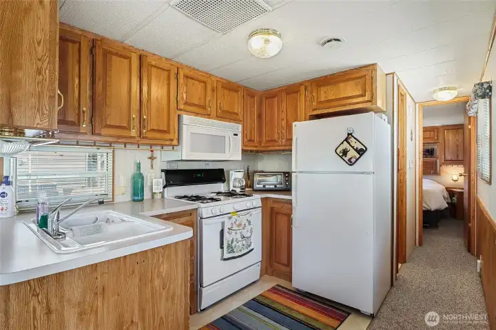 Kitchen positioned for easy flow into the living area.