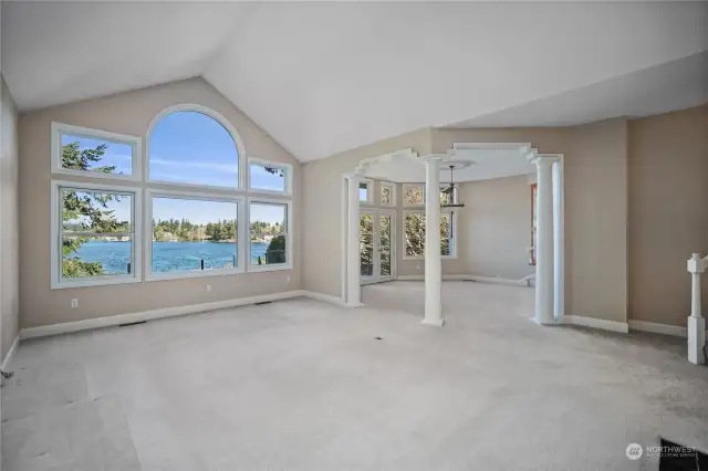 Living room has incredible views of the lake with big open windows!