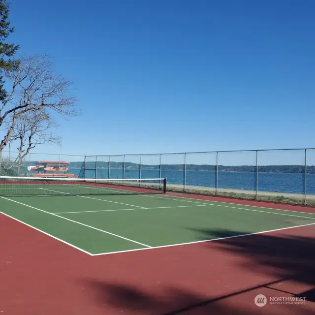 Tennis by the beach at spit/lagoon area.