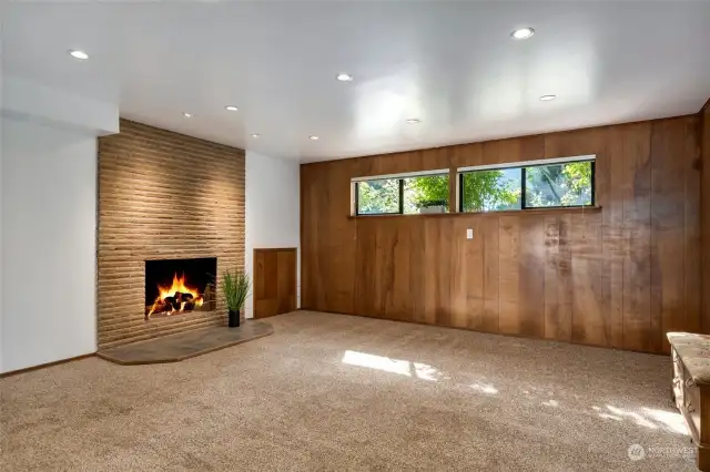 Downstairs family room area is huge! Another woodburning fireplace