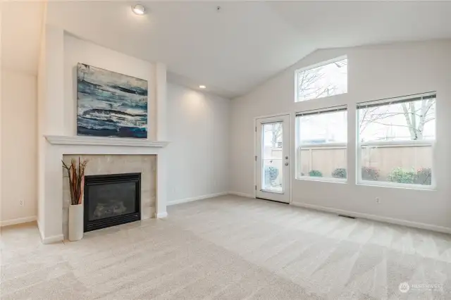 Spacious living room with vaulted ceiling