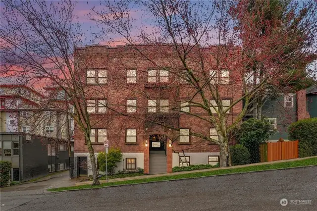 Welcome to a classic 1917 brick condominium building in the heart of Cap Hill.