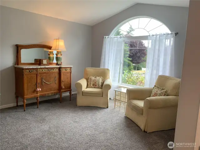 Open and bright living room with vaulted ceilings