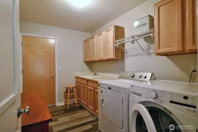Large Utility room ,door leads to 3 car garage