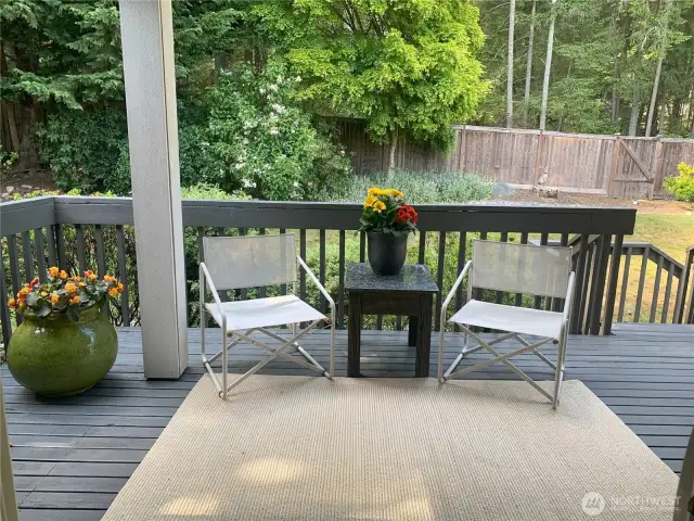 Covered patio outside of Kitchen, family room perfect for BBQ and outside entertaining