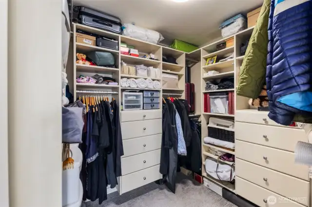 Very well organized primary walk-in closet