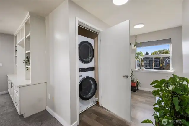 Built-in bookcase (new in 2021) and an LG washer/dryer set
