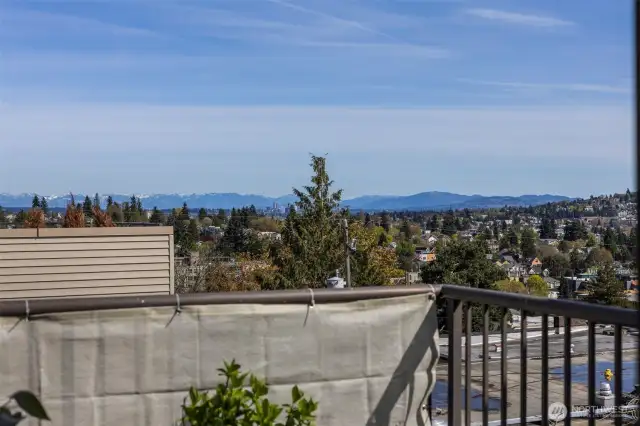 Balcony view of Bellevue & The North Cascade Mountains
