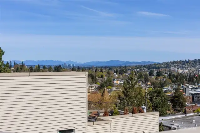 Facing east. Bellevue & The mountains.