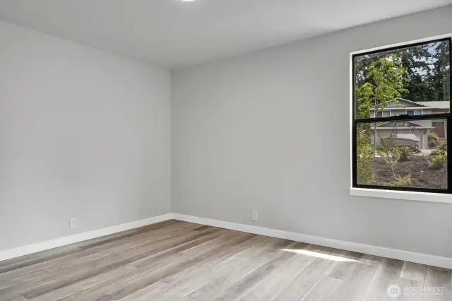 Main floor office with the flexibility to serve as a fourth bedroom.