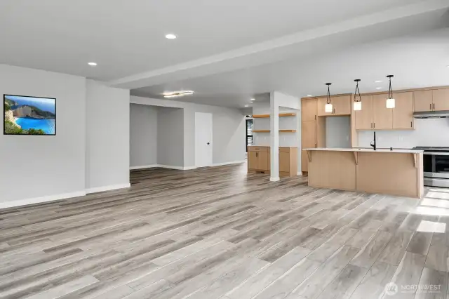 Generous space for both lounging and dining. The large island provides casual seating or a great homework area!