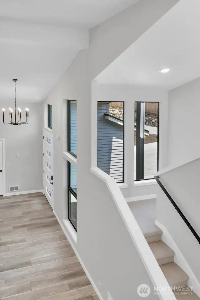 Soaring entry from the upstairs landing.