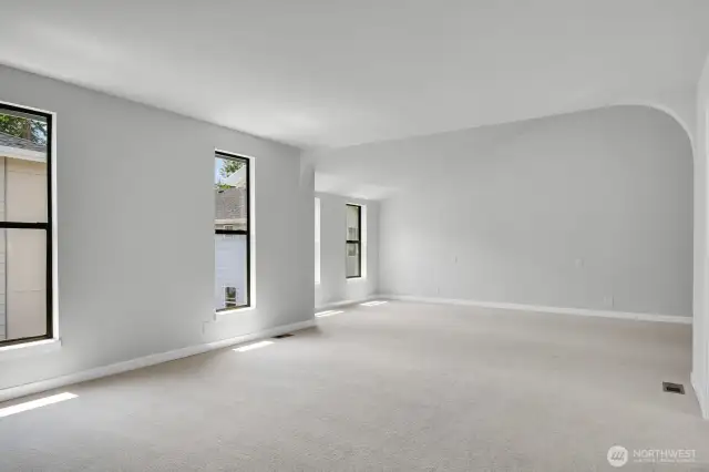 Step into the expansive primary bedroom—spacious enough to accommodate a private sitting area.