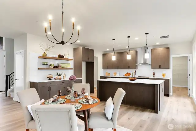 Photo is from another home in the plat but is representative of the style and finishes that will be at Lot 3.