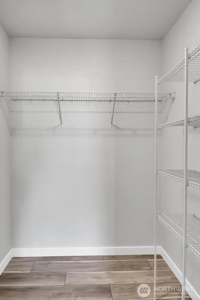 The ADU bedroom includes a convenient walk-in closet.