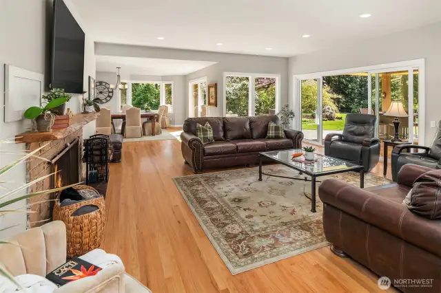 Light-filled and gorgeous, private outlooks from nearly every room. Relax in the Family room with the oversized wood fireplace, and three door accesses to the back yard.
