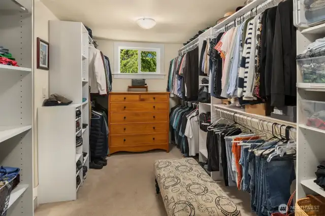 Primary suite with expansive walk-in closet and spa like bathroom with large soaking tub.