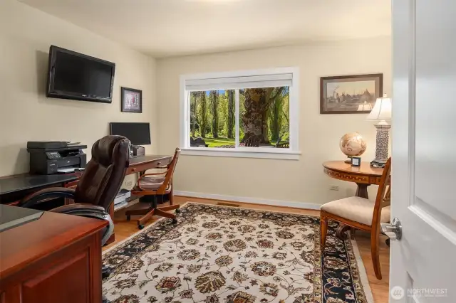Here is one of the two secondary bedrooms where the hardwood floors run through each of them.