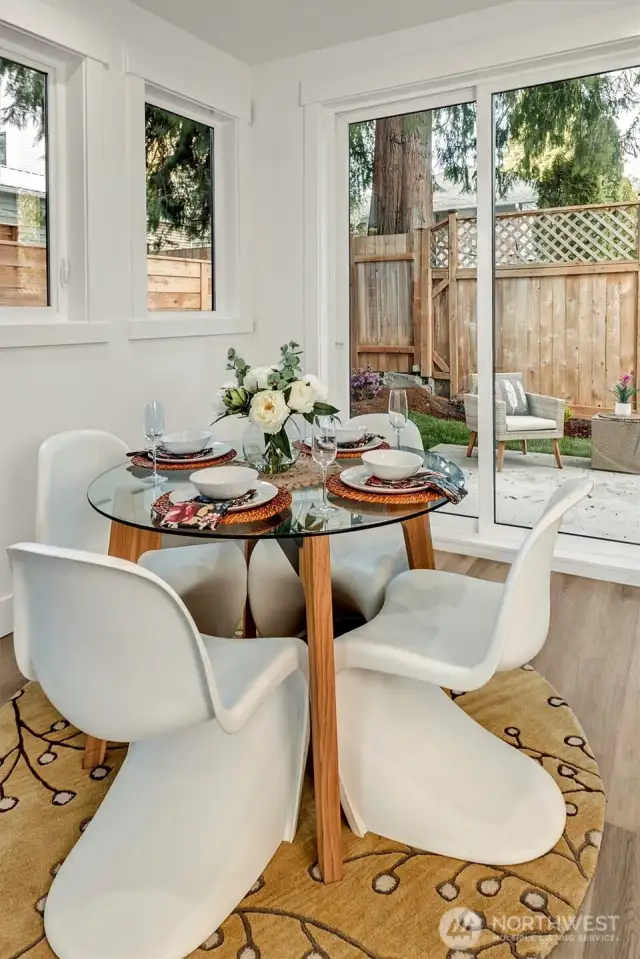 Sip morning coffee or enjoy relaxing dinners w/access to private yard