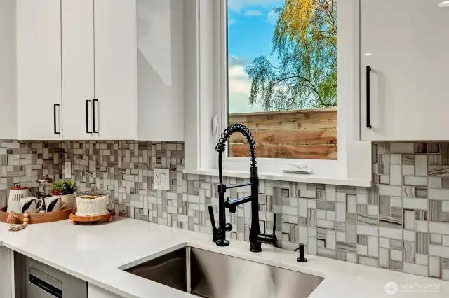 Sleek tile & crips cabinets refreshingly inviting