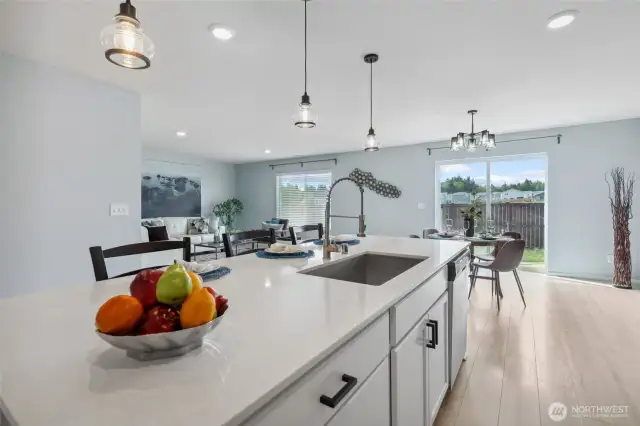 Large kitchen island connects the kitchen to the great room seamlessly