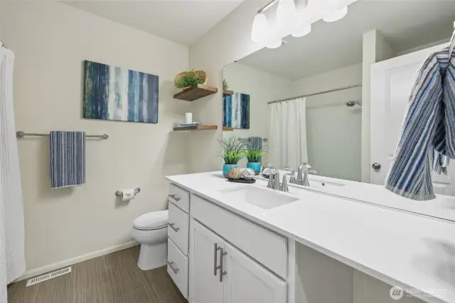 Full guest bathroom upstairs, central to the floorplan.