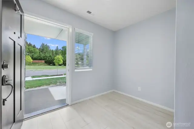 Front door opens to a small nook, perfect for kicking your shoes off!
