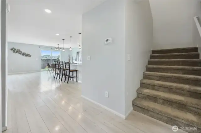 Bright, large floorplan, opens up just past office space.