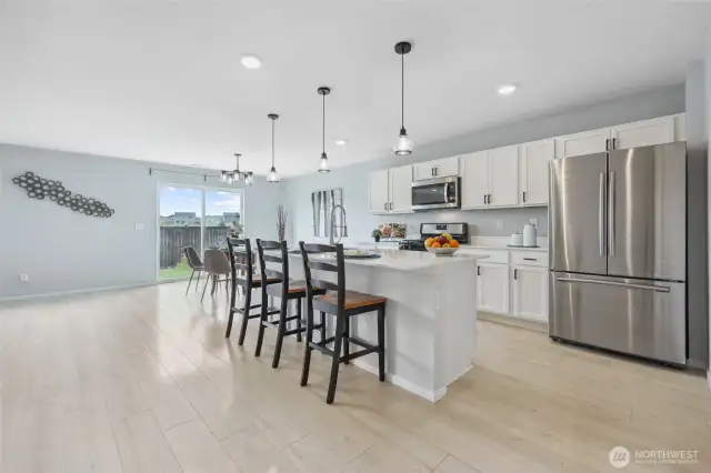 Open kitchen/great room, with breakfast bar.