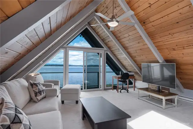 Upstairs to large loft with slider door.