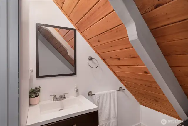1/2 bath is off the upstairs bedroom.