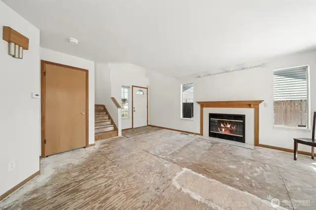 Carpet removed. Seller credit of $5,000 toward carpet replacement.  Gas-log fireplace.