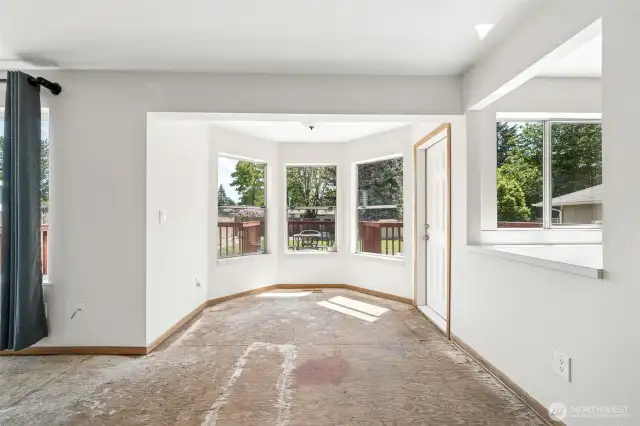 Dining area with access to deck.