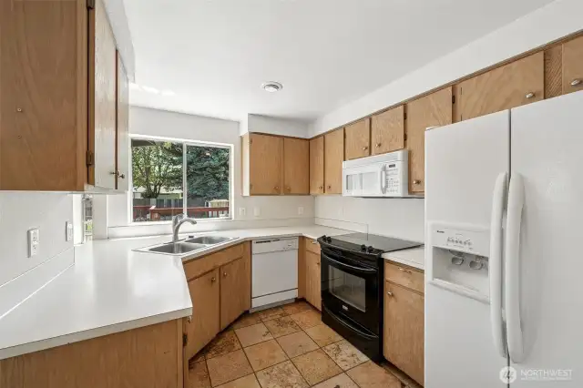 All appliances stay including washer/dryer and garage refrigerator.