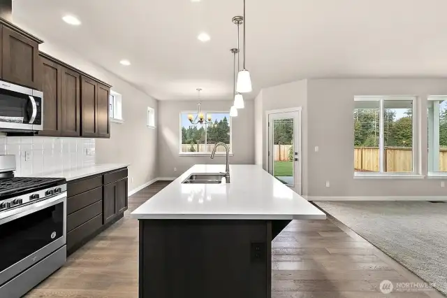 Home is under construction.  Photos are of a previously bult home in a different community with similar finishes.  Builder reserves the right to make changes to plans & specifications without notice.  Features vary by plan.  Buyer to verify square footage.