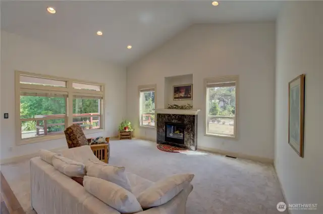 Looking at the main floor living room and gas fireplace.