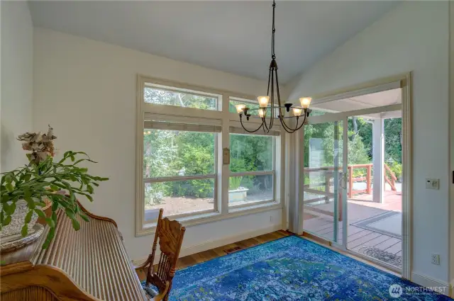 Dining room with a sliding door to the covered rear deck.