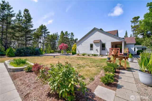 Oversized 15,246 square foot .35 acre lot with walking paths, fire pit and gardens with sprinkler system. All this with a great southern exposure.