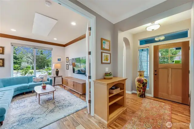 Off the entry is the den/office with solid doors and crown molding. Thru the arch doorway is the second bedroom & bath.