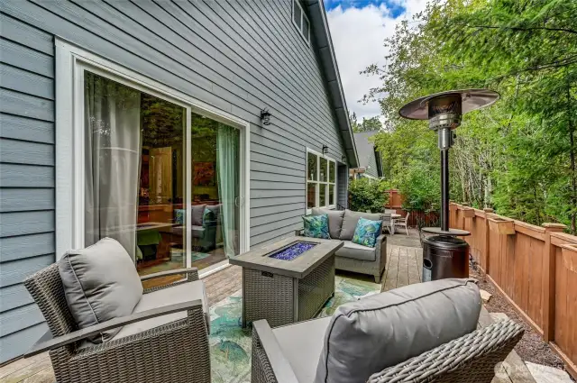 The entertaining sized deck and patio overlooks the greenbelt area and is super private.