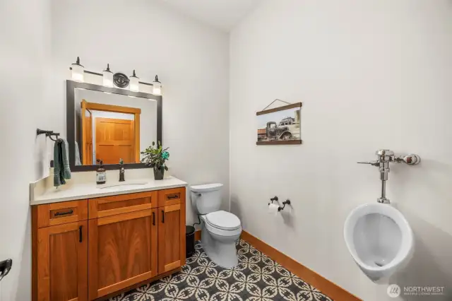 Half bath conveniently located near garage entrance