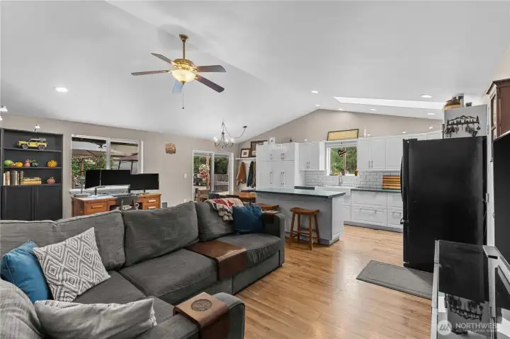 Living Room w/Newer Laminate Floors, Vaulted Ceiling, Ceiling Fan and Updated Kitchen!