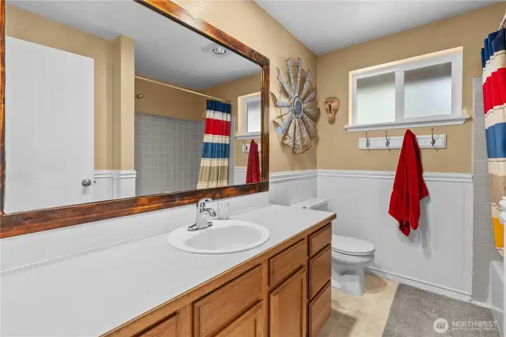 Updated Hall Bath w/Extra Large Vanity and Tiled Tub/Shower Surround